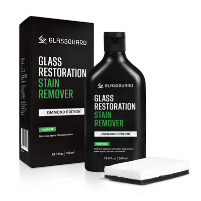 GLASSGUARD Glass Restoration Stain Remover Diamond Edition bottle with scourer sponge used to remove hard water stains and mineral build-up from glass.